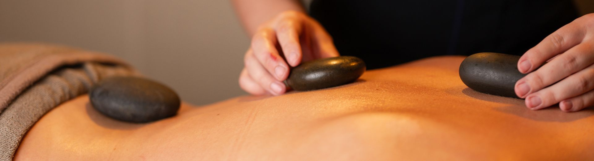Full body hot stone massage www.roeparkresort.com